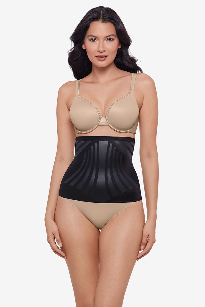 Woman wearing a black waist cincher