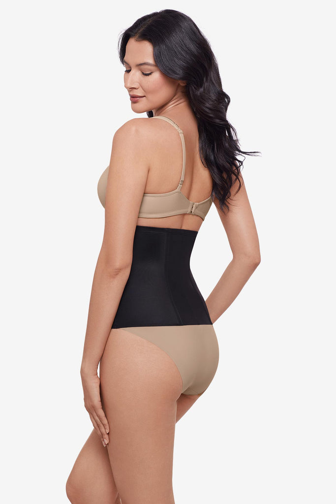 Woman turned left wearing a black waist cincher