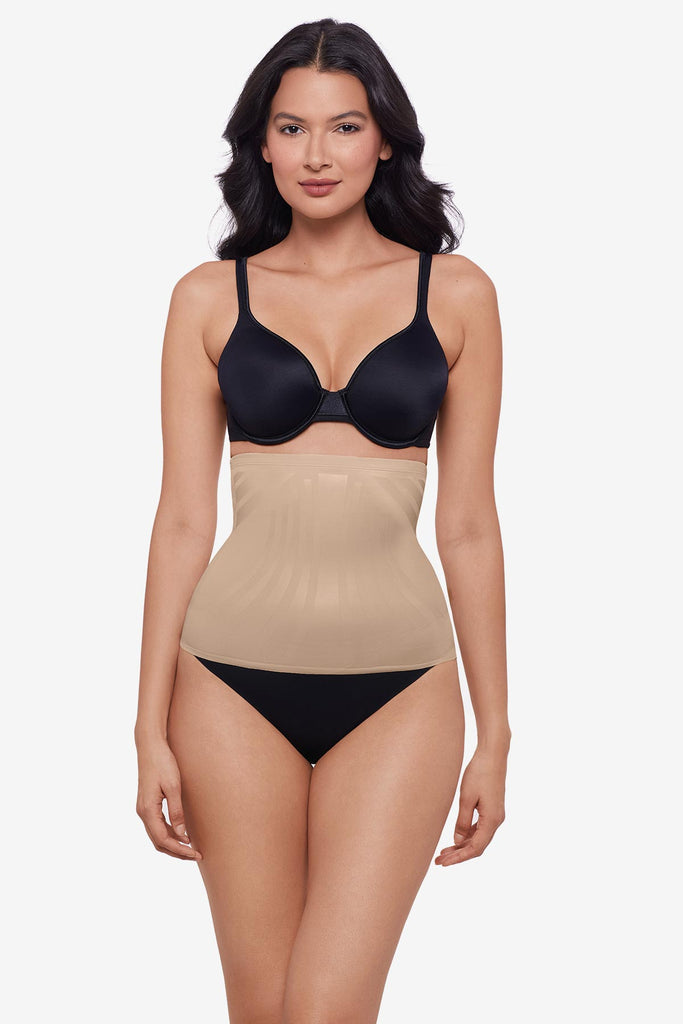 Woman wearing a warm beige waist cincher