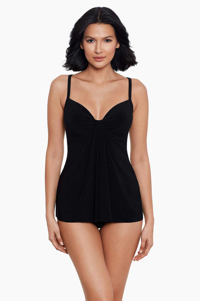 Woman wearing a slimming tankini top.