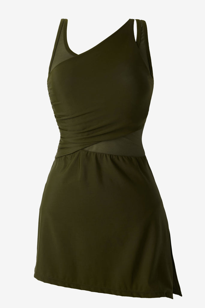 Nori green swim dress with a mesh cut out on the right