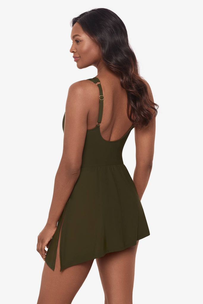 Woman facing left to show detail of nori green swim dress