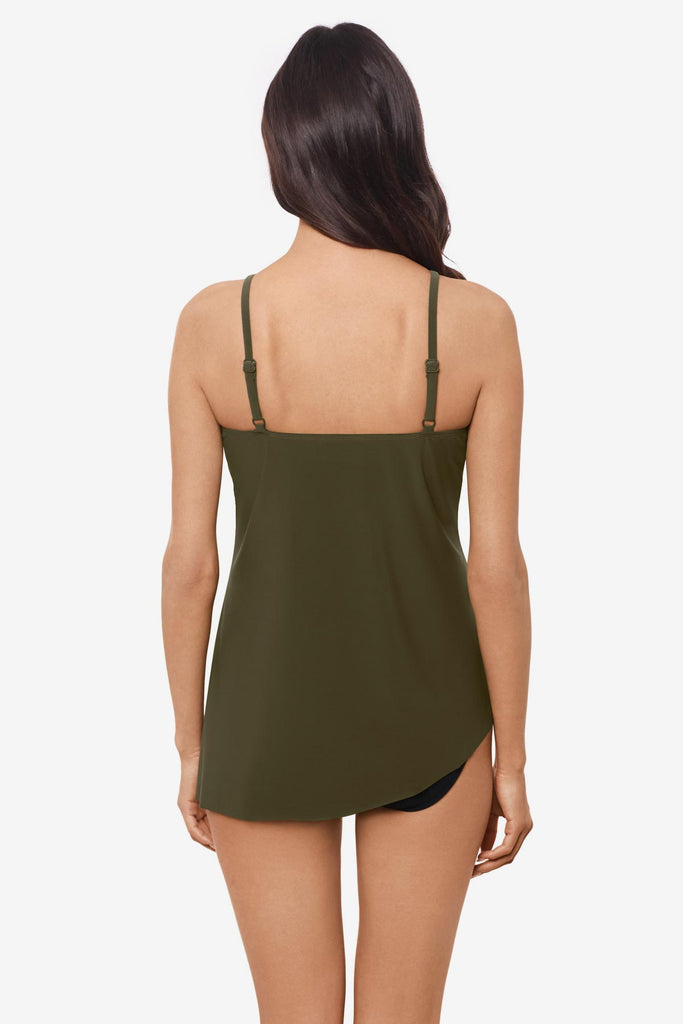 Woman facing away wearing a bamboo green tankini top with beading along the neckline