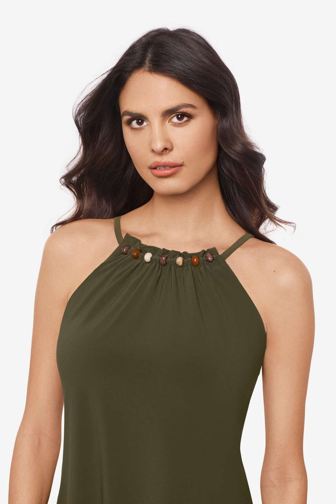 Close up of woman wearing a bamboo green tankini top with beading along the neckline