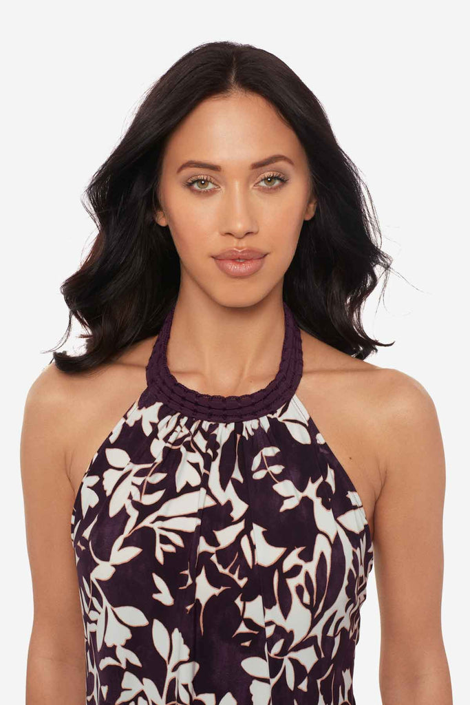 Close up of woman wearing a multicolor tankini top with white flowers