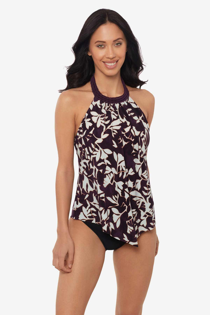Woman wearing a multicolor tankini top with white flowers