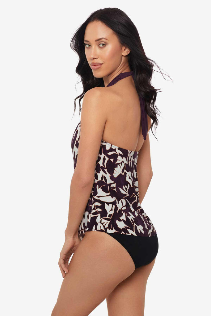 Woman turned to the left showing off the detail of tankini top