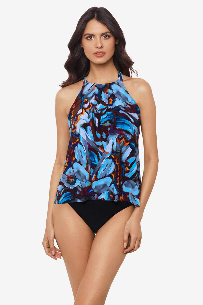 Woman wearing a multicolor tankini top with abstract flowers