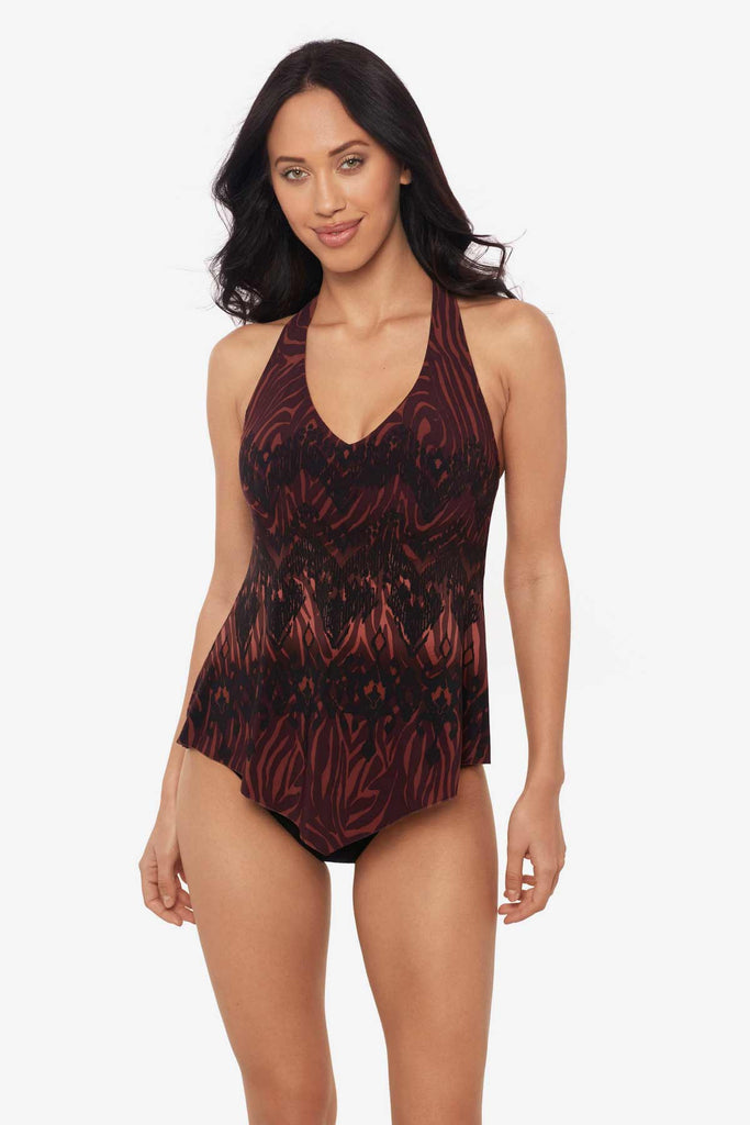 Woman wearing a multicolor tankini top with an abstract animal print
