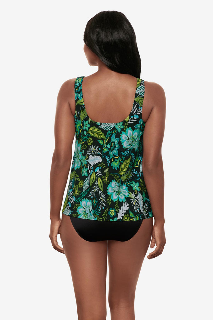 Woman faced away wearing a multicolored floral printed tankini top