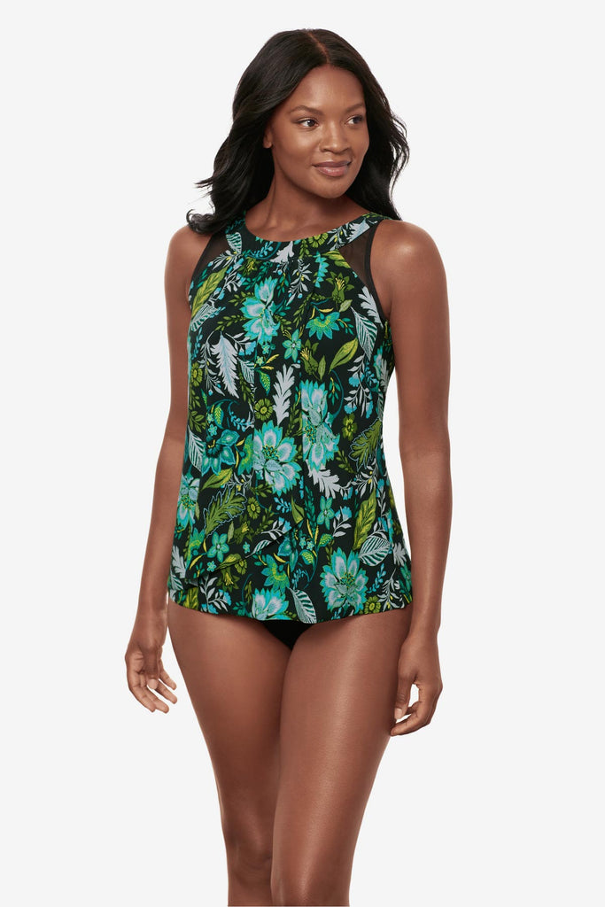 Woman wearing a multicolored floral printed tankini top