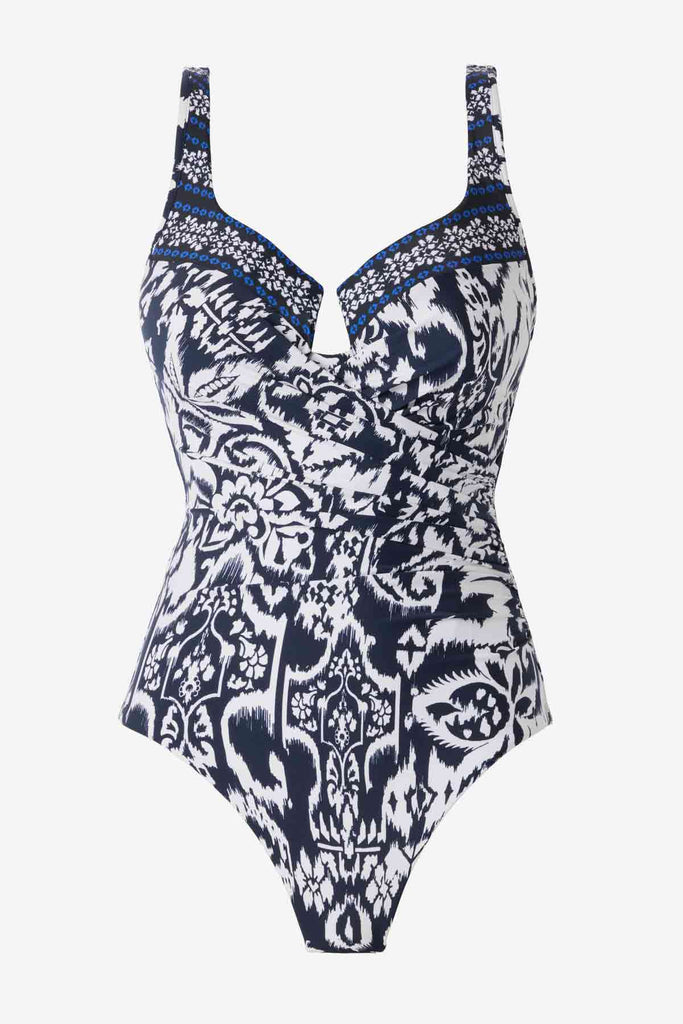 Blue and white one-piece swimsuit with a sweetheart neckline