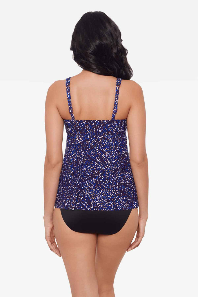 Woman facing away to show off the multicolor tankini top