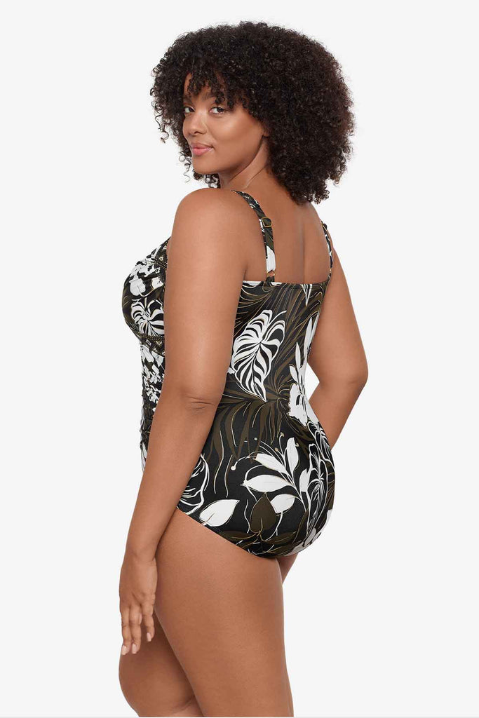 Woman turned to the side to show off detail of swimsuit