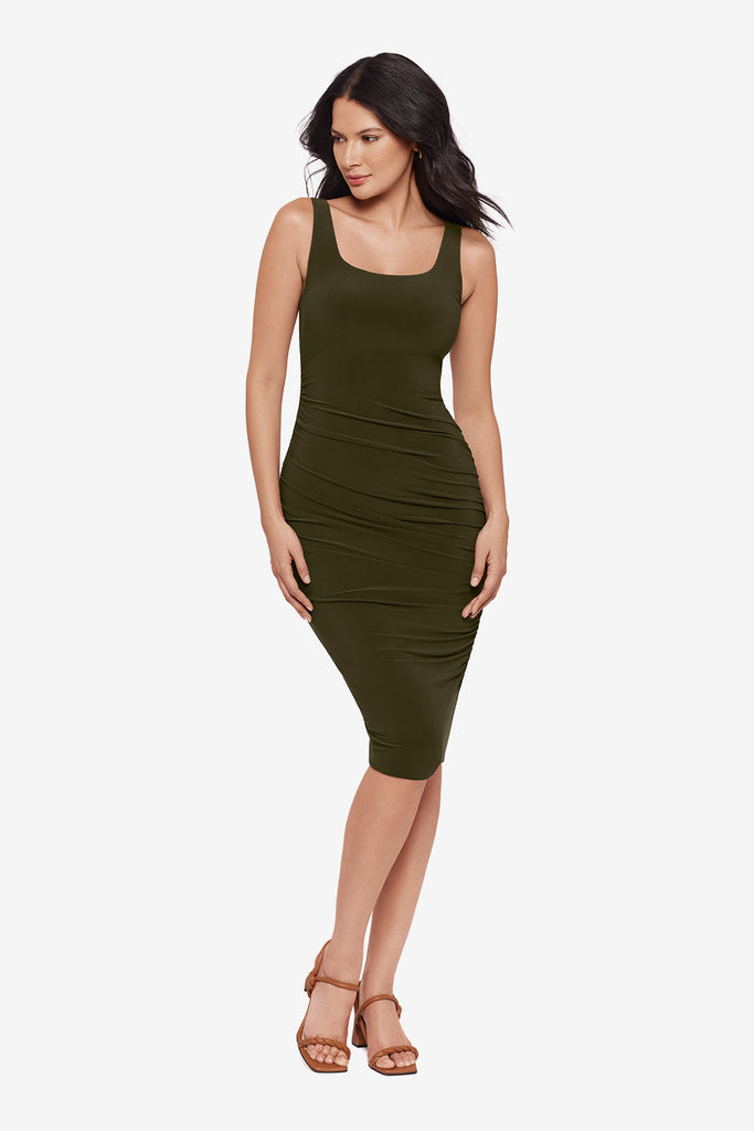 Woman wearing a scoop-neck nori green mid length dress