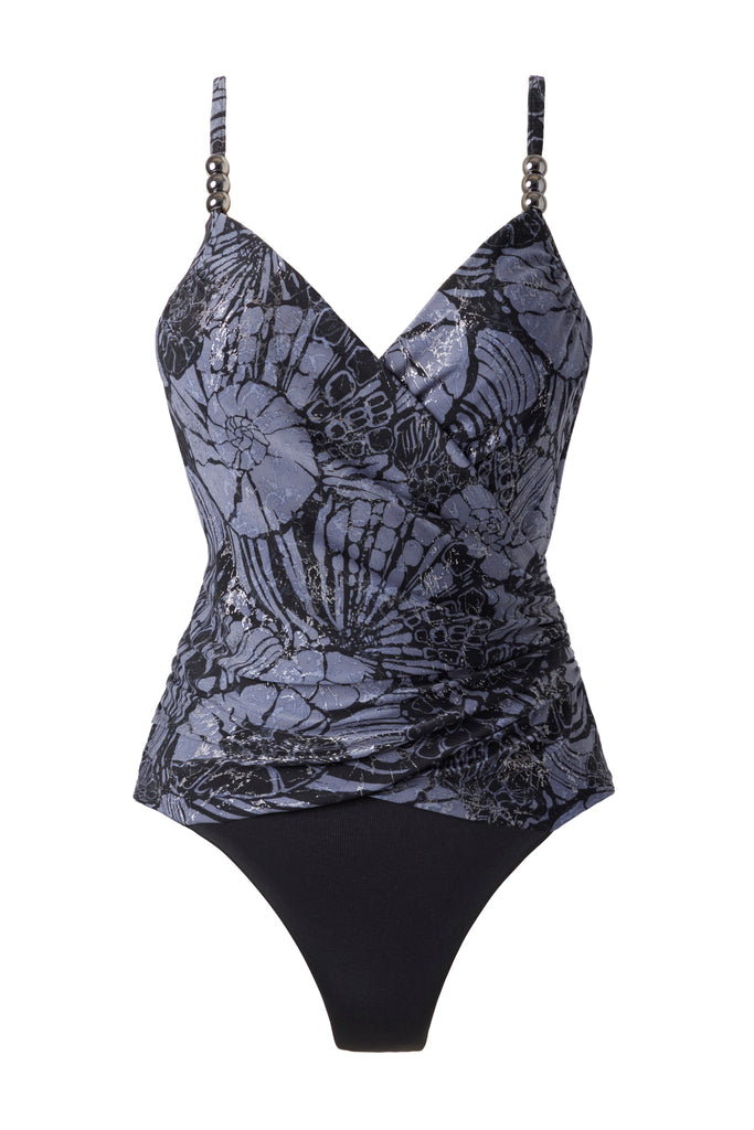 Shimmery one-piece swimsuit with a blue shell pattern