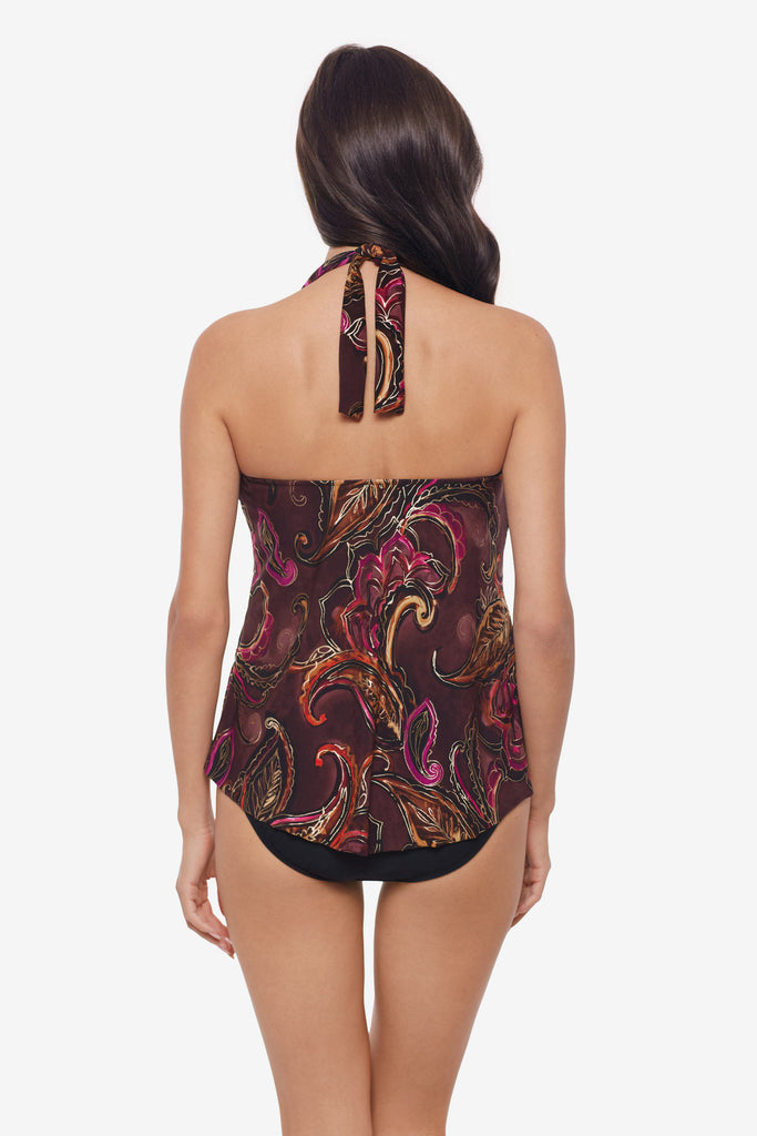 Woman turned away wearing a multicolored paisley printed tankini top