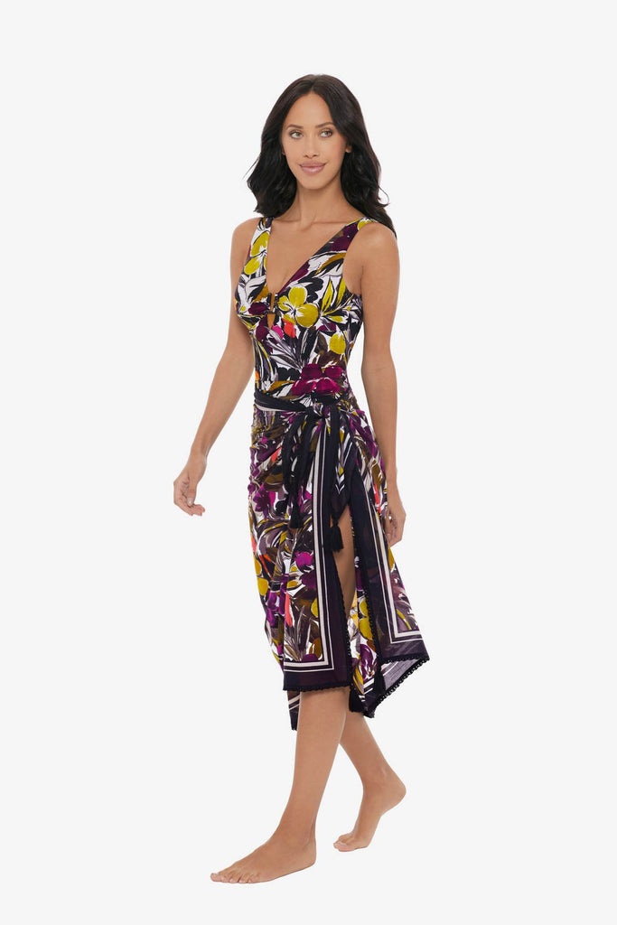 Woman turned left wearing a multicolored floral print cover up