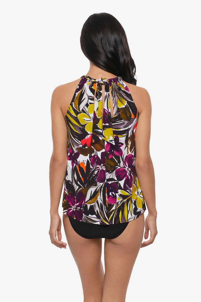 Woman turned away wearing a multicolored floral printed high neck tankini top