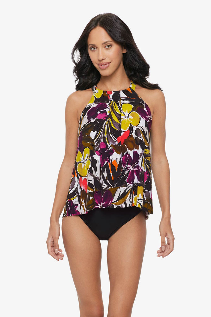 Woman wearing a multicolored floral printed high neck tankini top