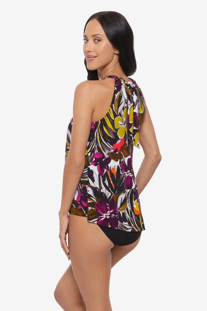Woman turned left wearing a multicolored floral printed high neck tankini top