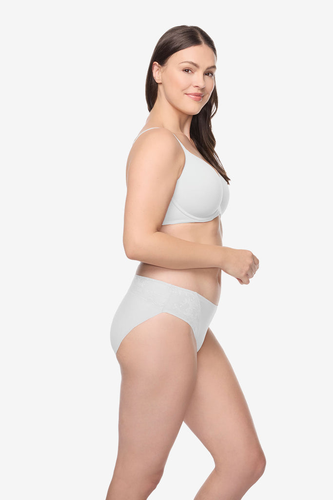 Woman turned right wearing a white bra and underwear set