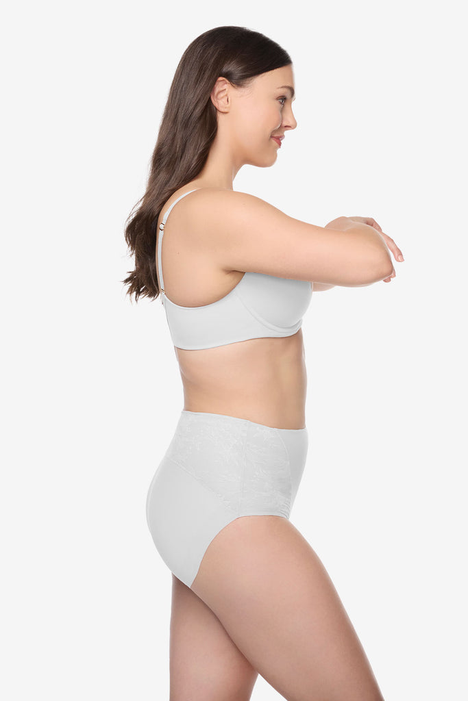 Woman turned right wearing a white bra and high waisted underwear set