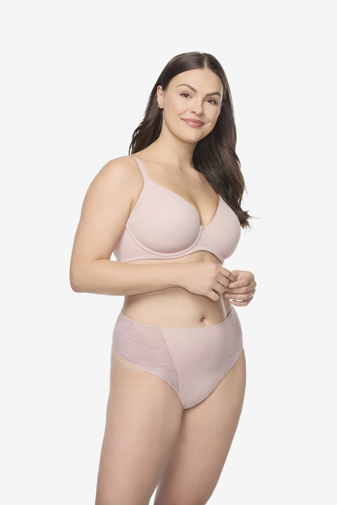 Woman wearing light pink thong shapewear