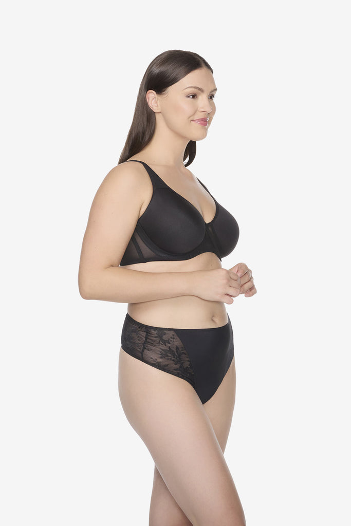 Woman wearing black thong shapewear