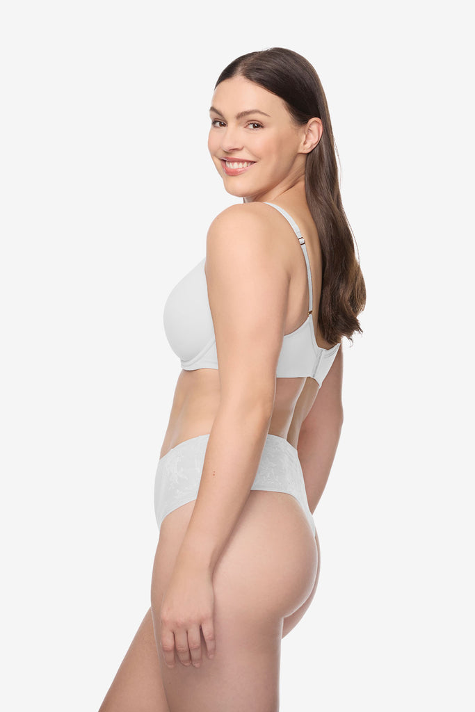 Woman turned left wearing a white bra and high waisted thong underwear set