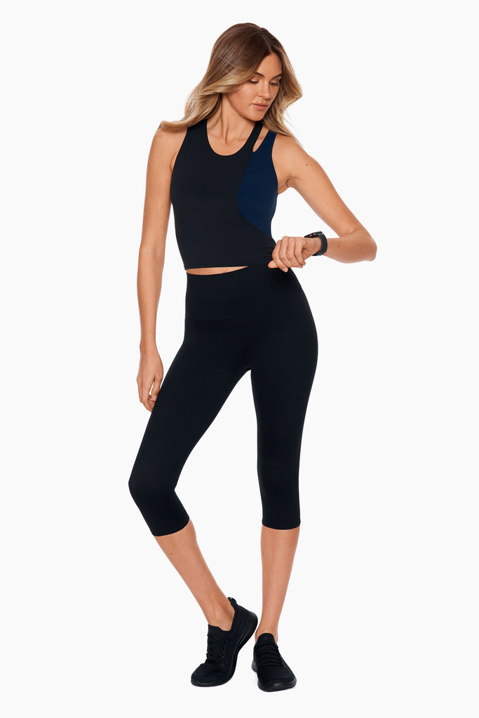 Woman in a capri legging.