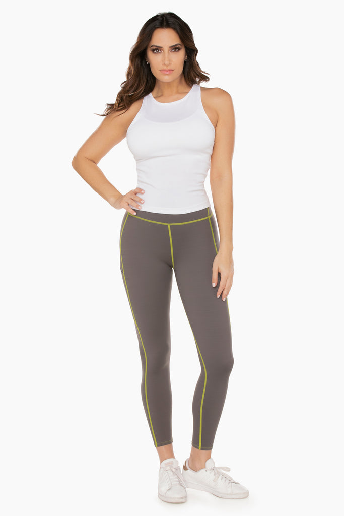 Woman wearing a miracle suit leggings.