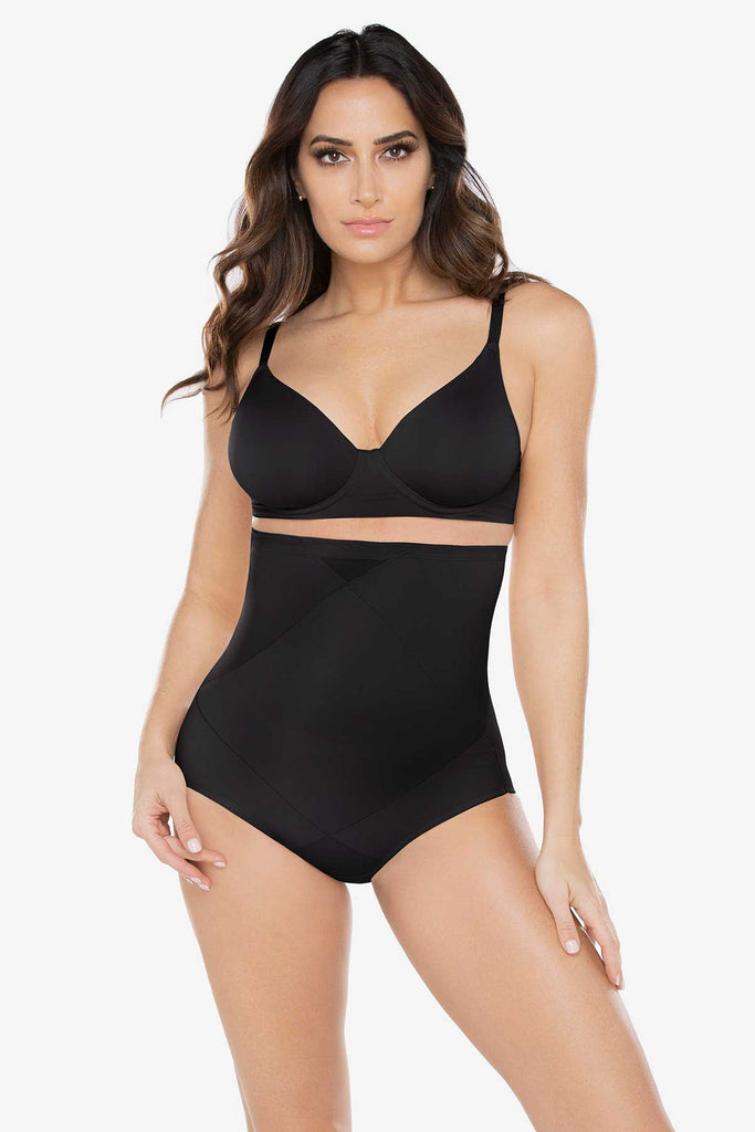 Woman in a tummy control high waisted shape wear.