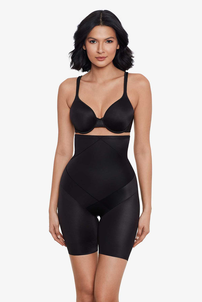 Woman in a tummy control high waist thigh slimmer.
