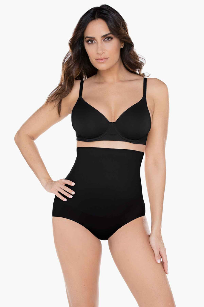 Woman wearing a shapewear swim wear.