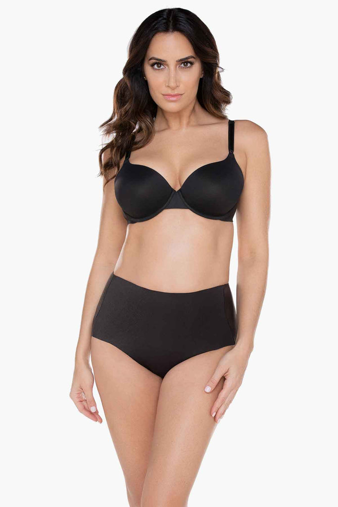 Woman wearing a shapewear swim suit.