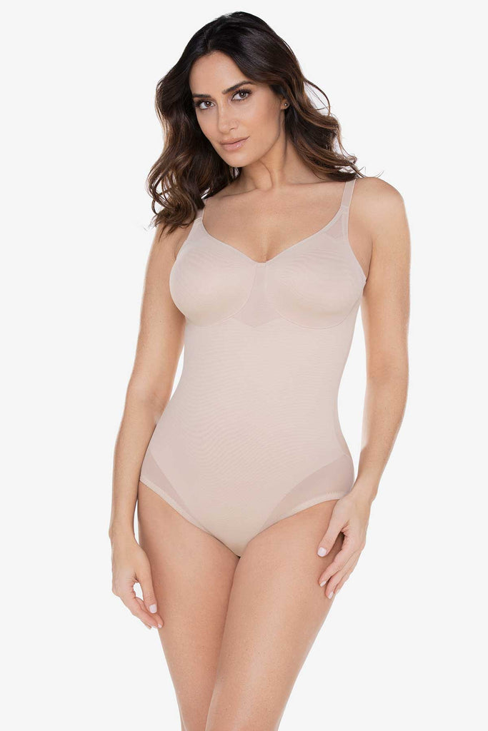 Woman in a sexy sheer shapewear.