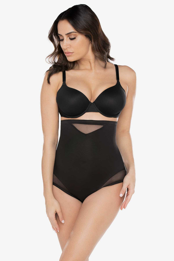 Woman wearing a shapewear swim wear.