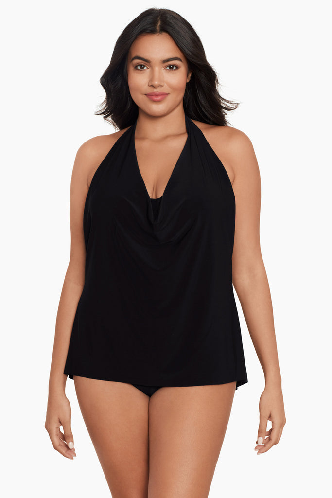 A stylish woman in a magic suit tankini top.