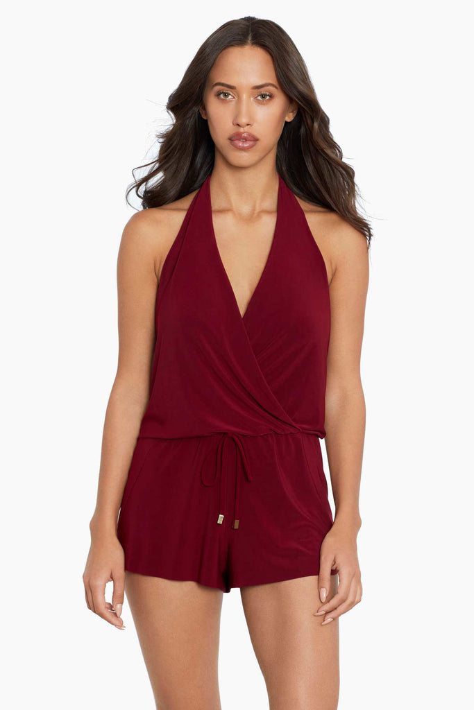 Woman in a magic suit one piece romper swim suit.