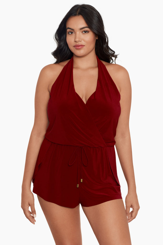 Woman in a plus size one piece romper swim suit.