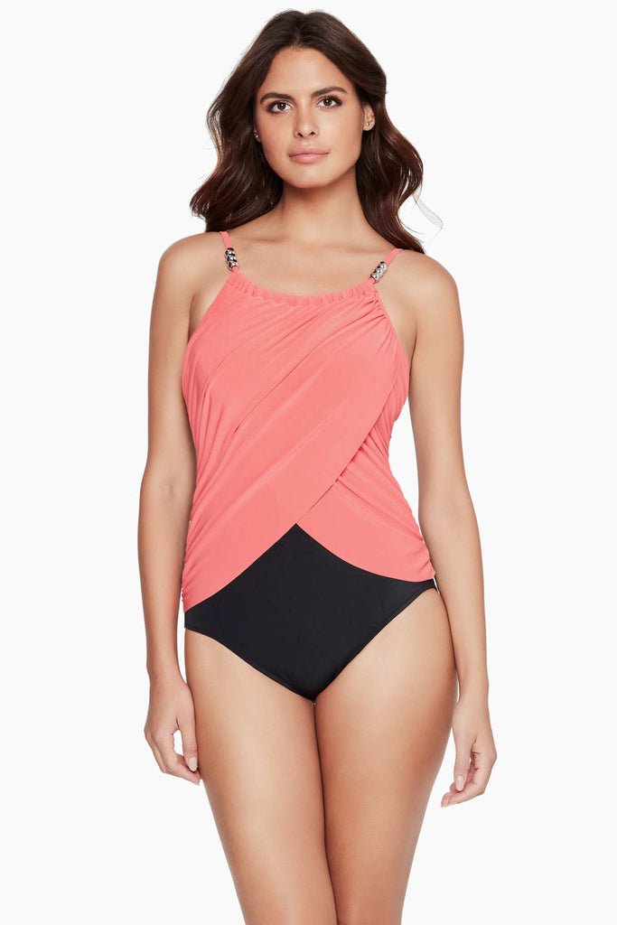 Woman wearing a magic suit one piece swim suit.