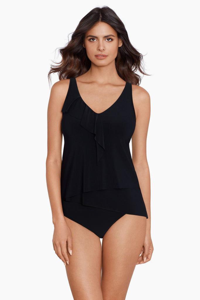 Woman wearing a magic suit tankini top.