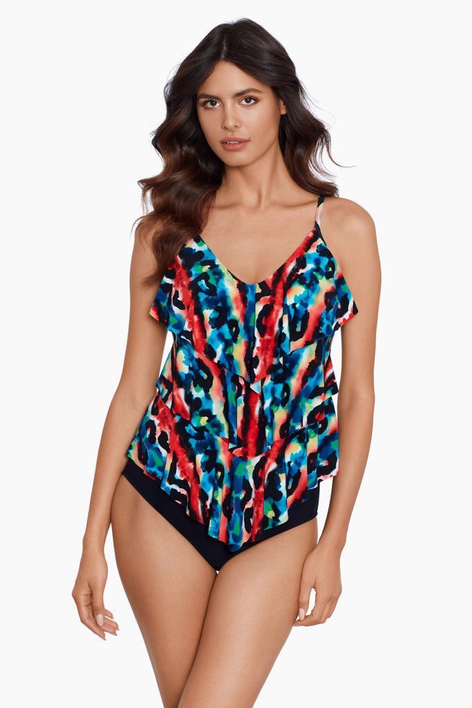 Woman in a multi color tankini top.