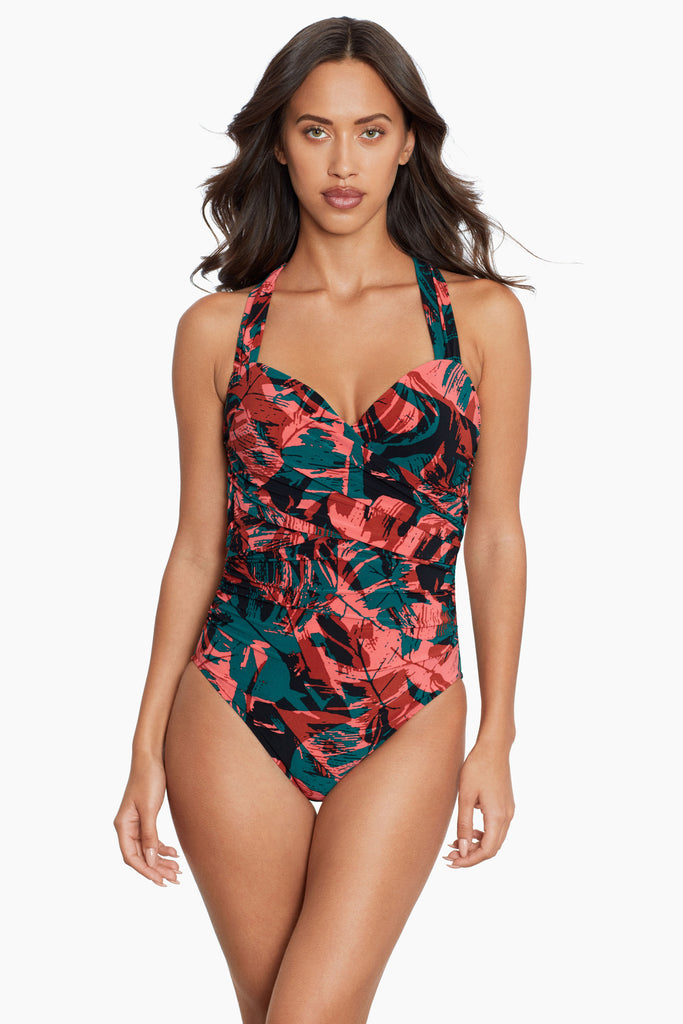 Woman looking hot in a one piece swim dress.