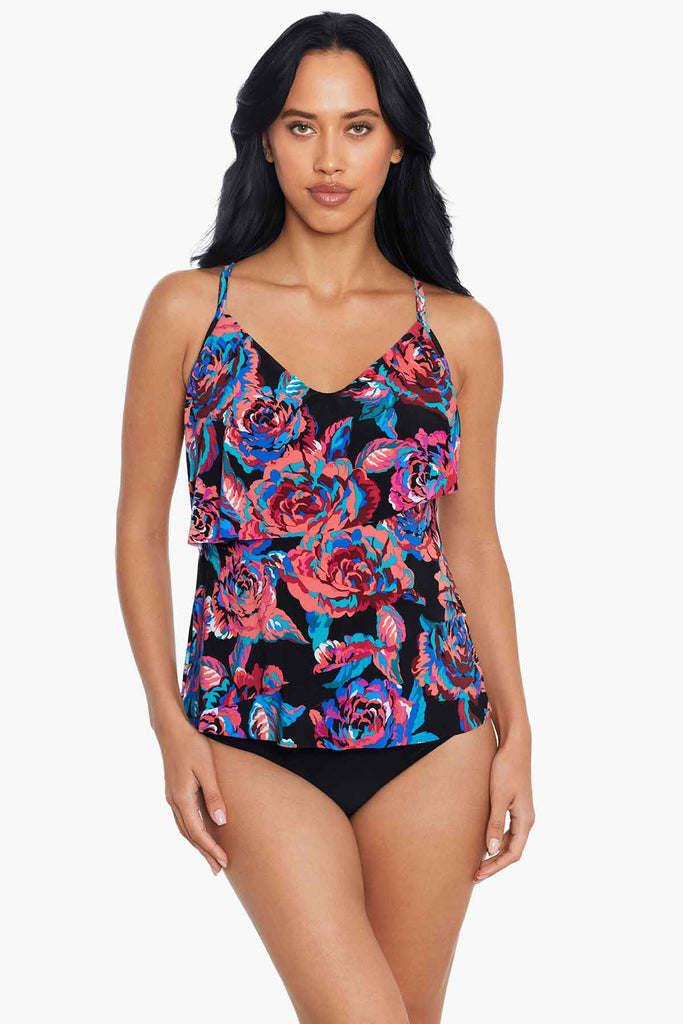 Woman in a floral printed tankini top.