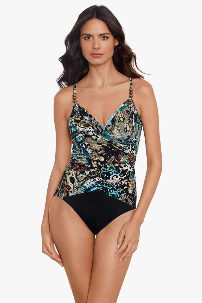 Woman in a magic suit one piece swim suit.