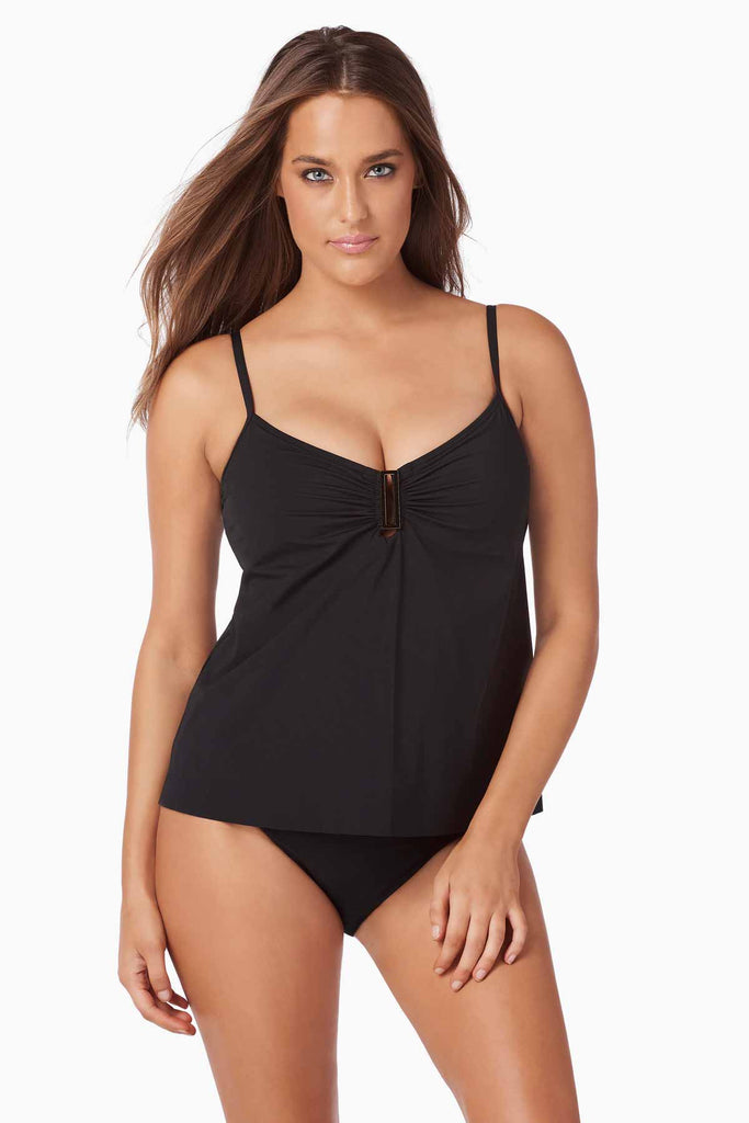 Woman looking hot in a tankini top.