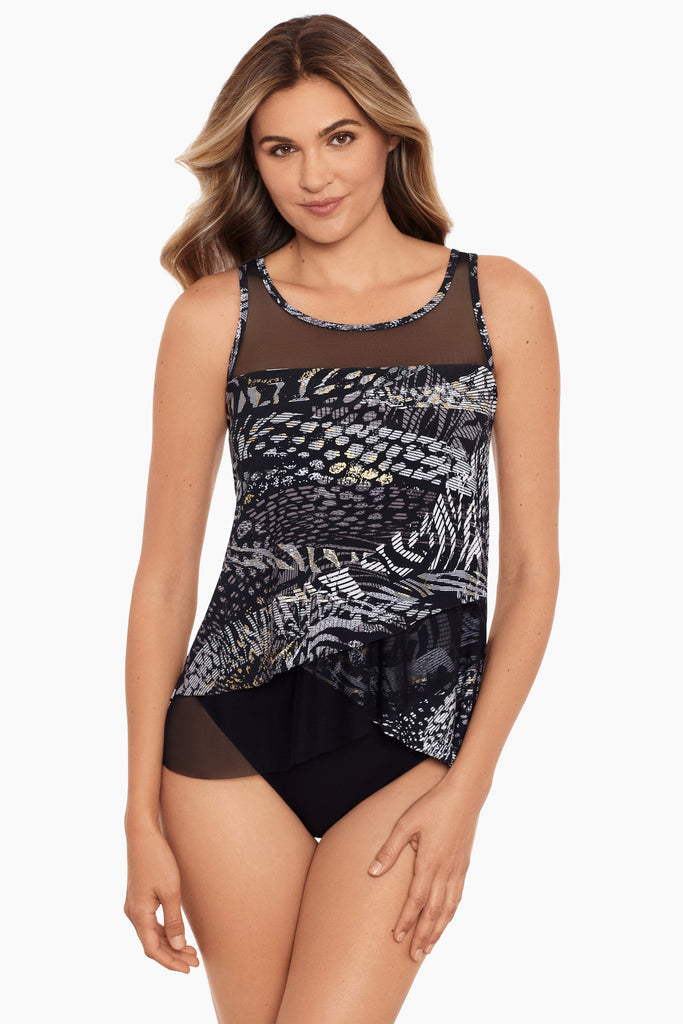 A young woman wearing a tankini top.