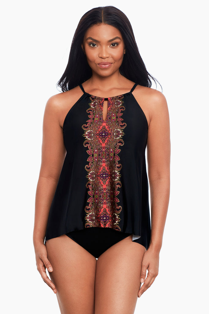 An african american woman wearing a tankini top.